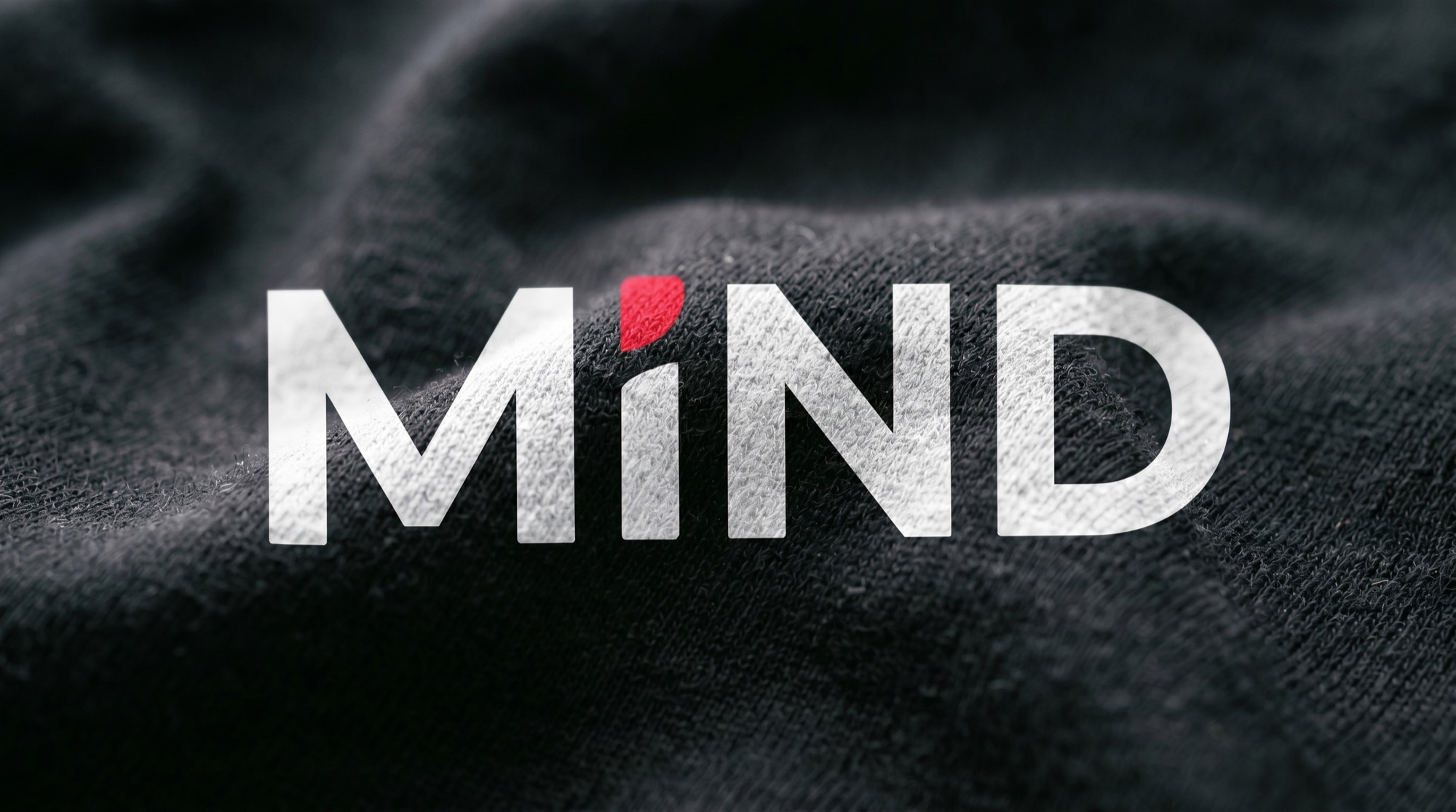 The MIND mark, screen-printed.